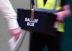 Ballot box being taken away
